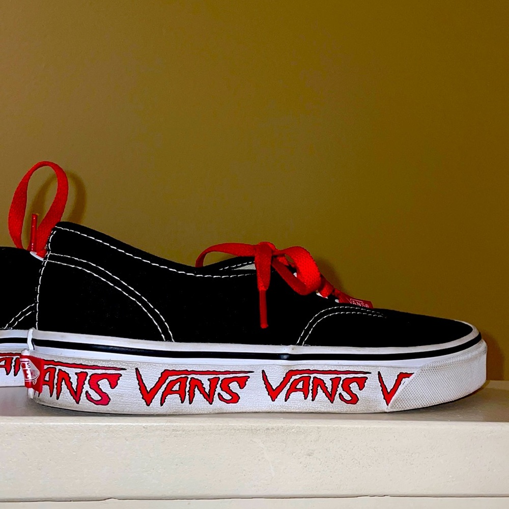 Vans size 7 in black with red laces